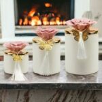 PORTACANDELA CON FIORE ROSA