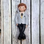 CALAMITA BIMBO PRIMA COMUNIONE